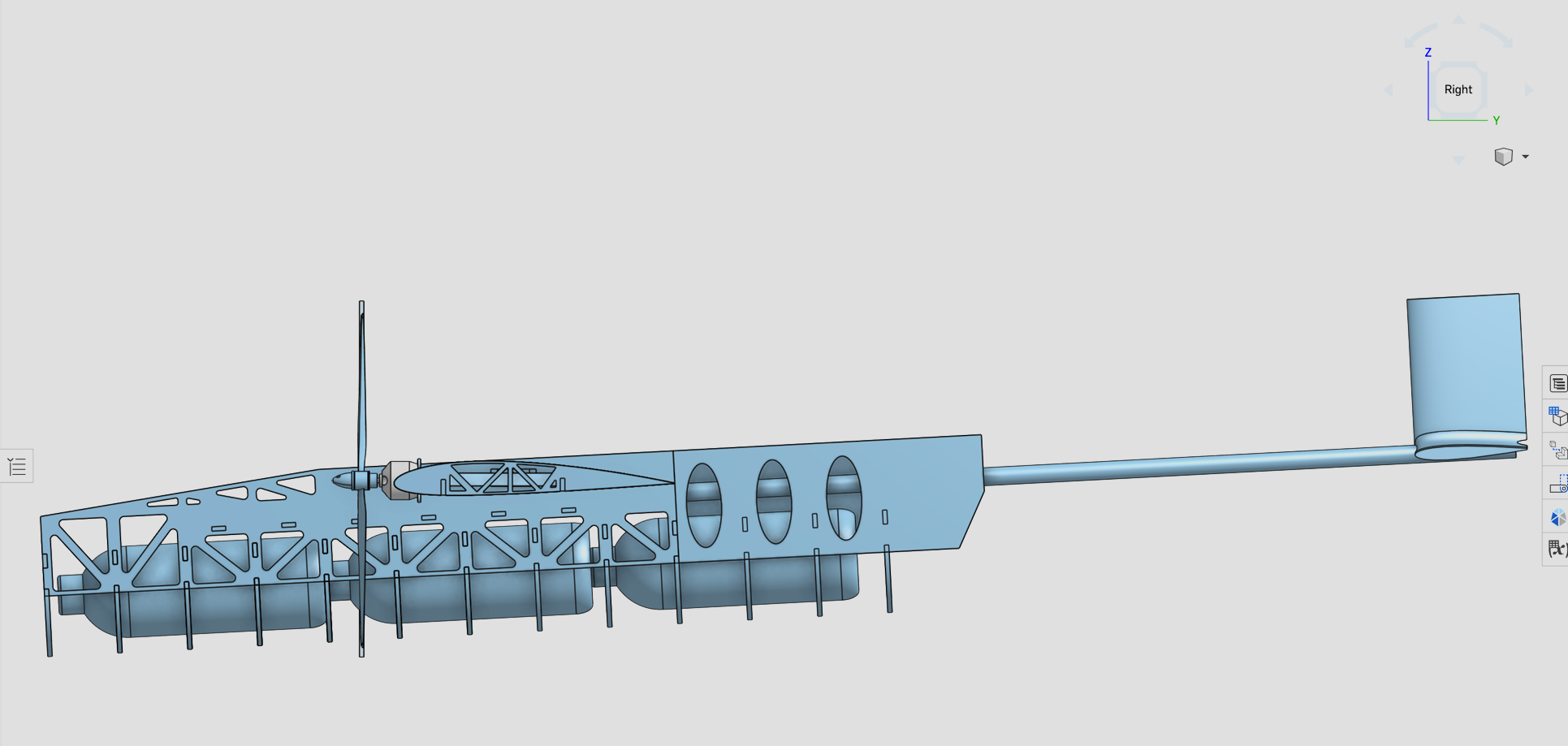 Full fuselage CAD assembly showing payload bays, tail boom, and vertical stabilizer